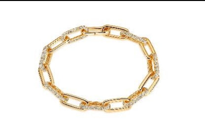 Gold tone paperclip bracelet with pave cz links