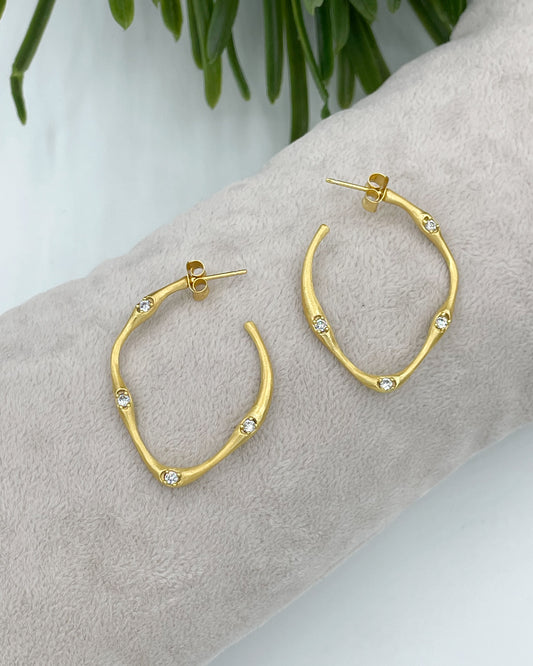Organic-look handmade earrings with cubic zirconia