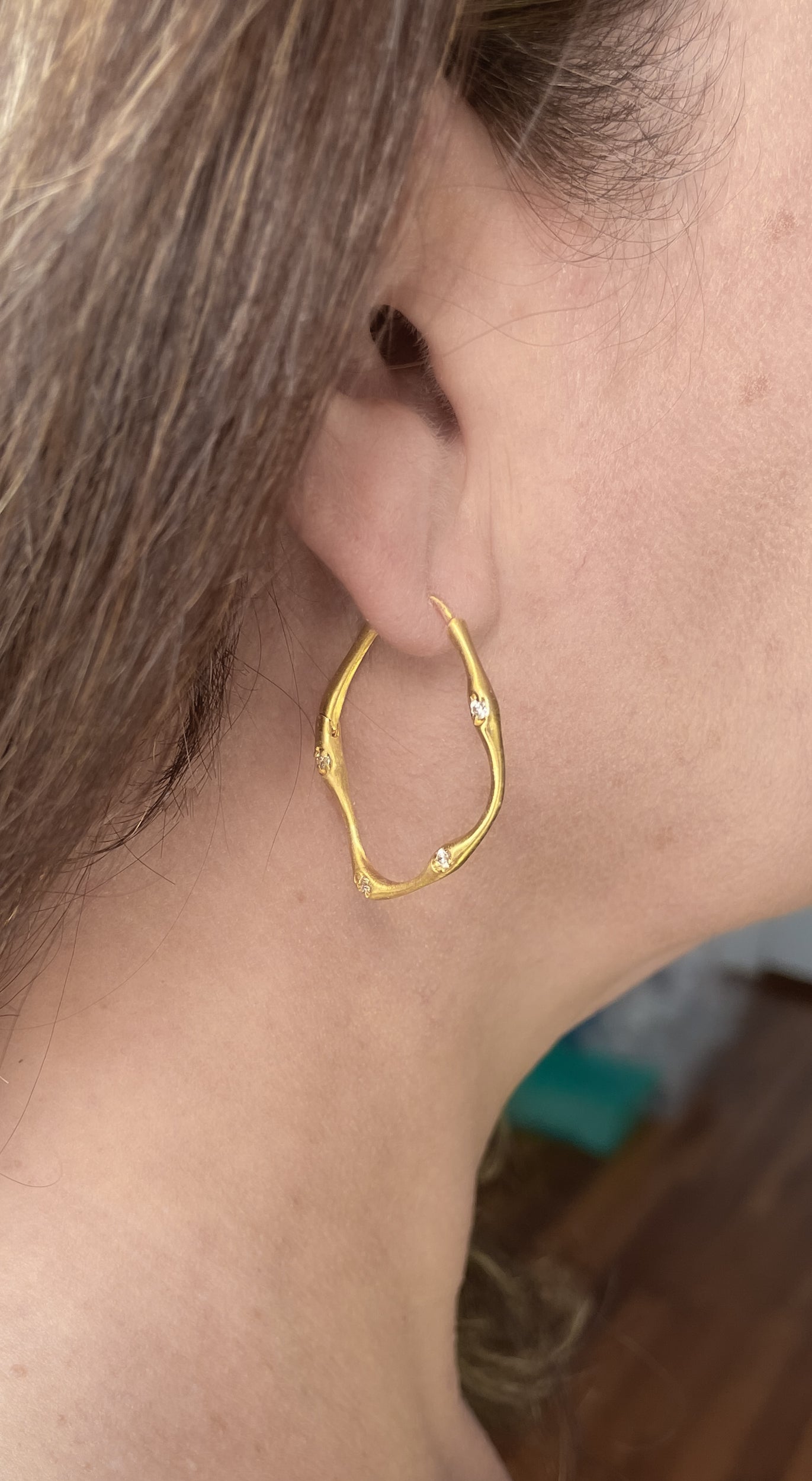 Organic-look handmade earrings with cubic zirconia