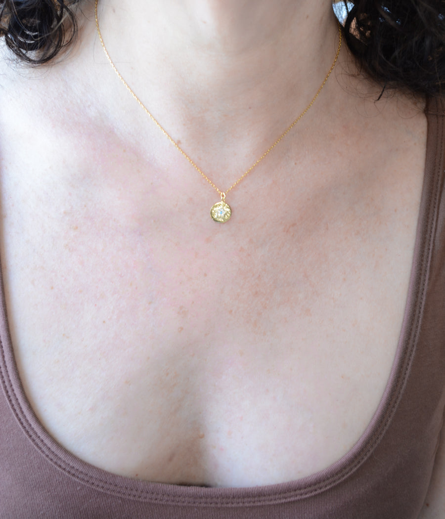 Gold star necklace with turquoise & cubic zirconia accents