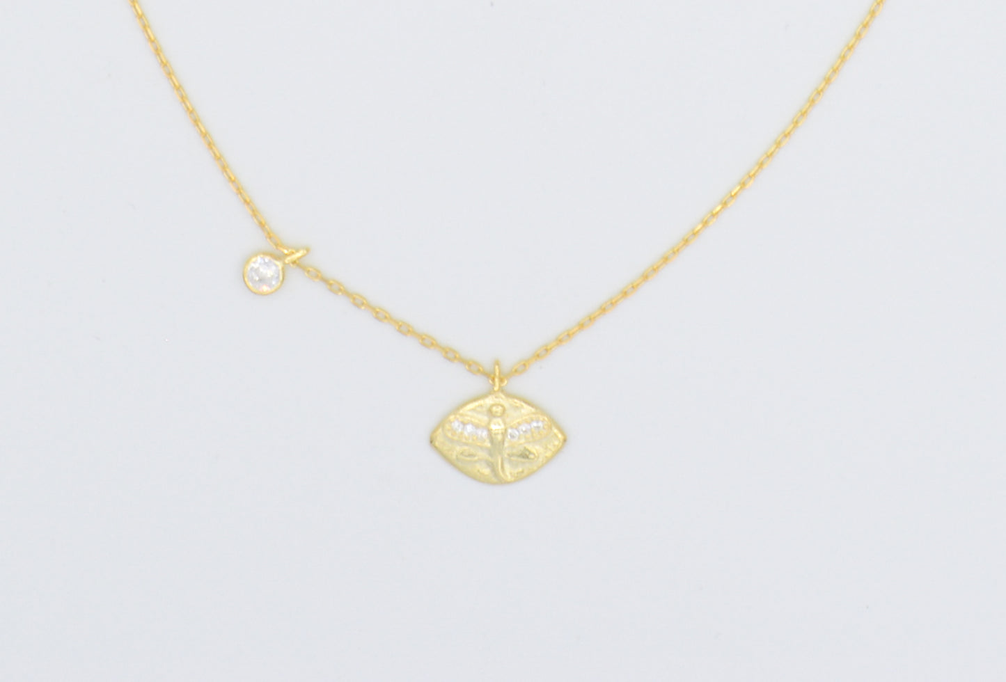 Gold dragonfly and cubic zirconia charm necklace