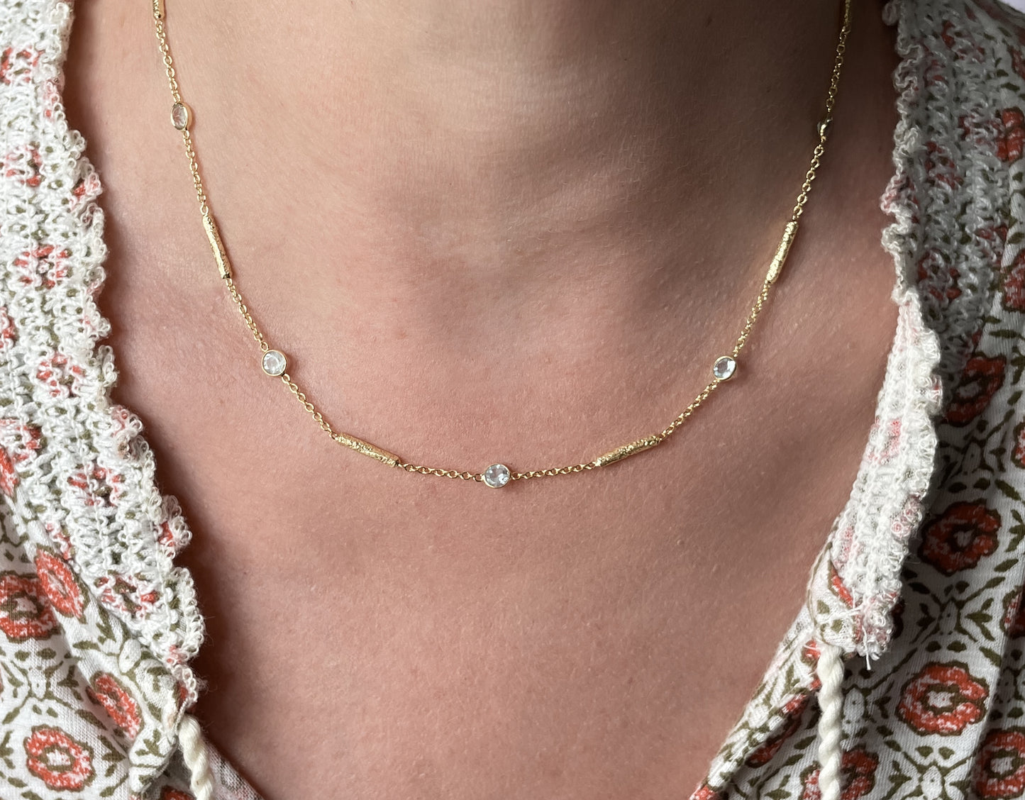 Blue topaz necklace with textured tube spacers