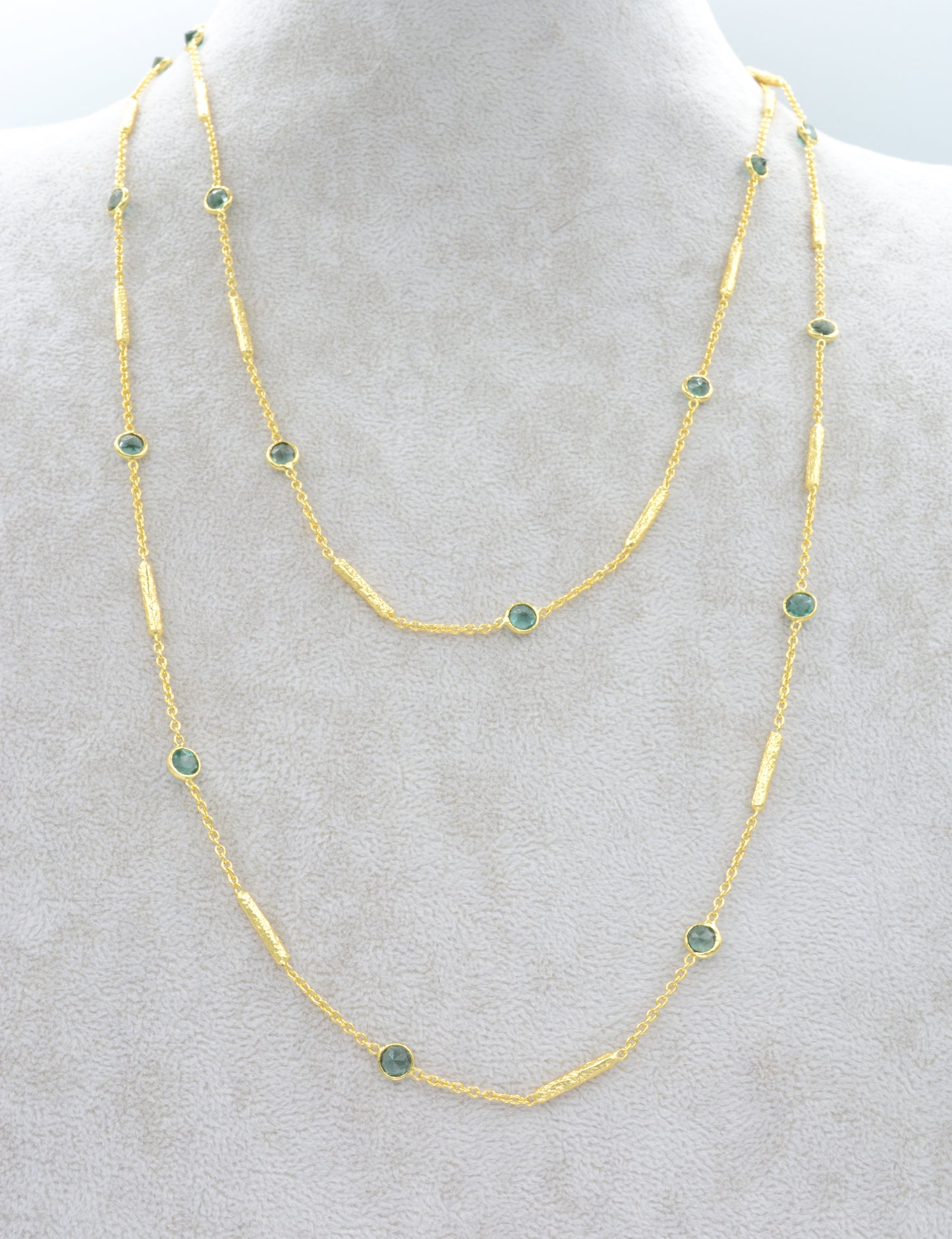 Long green tourmaline necklace with textured tube spacers