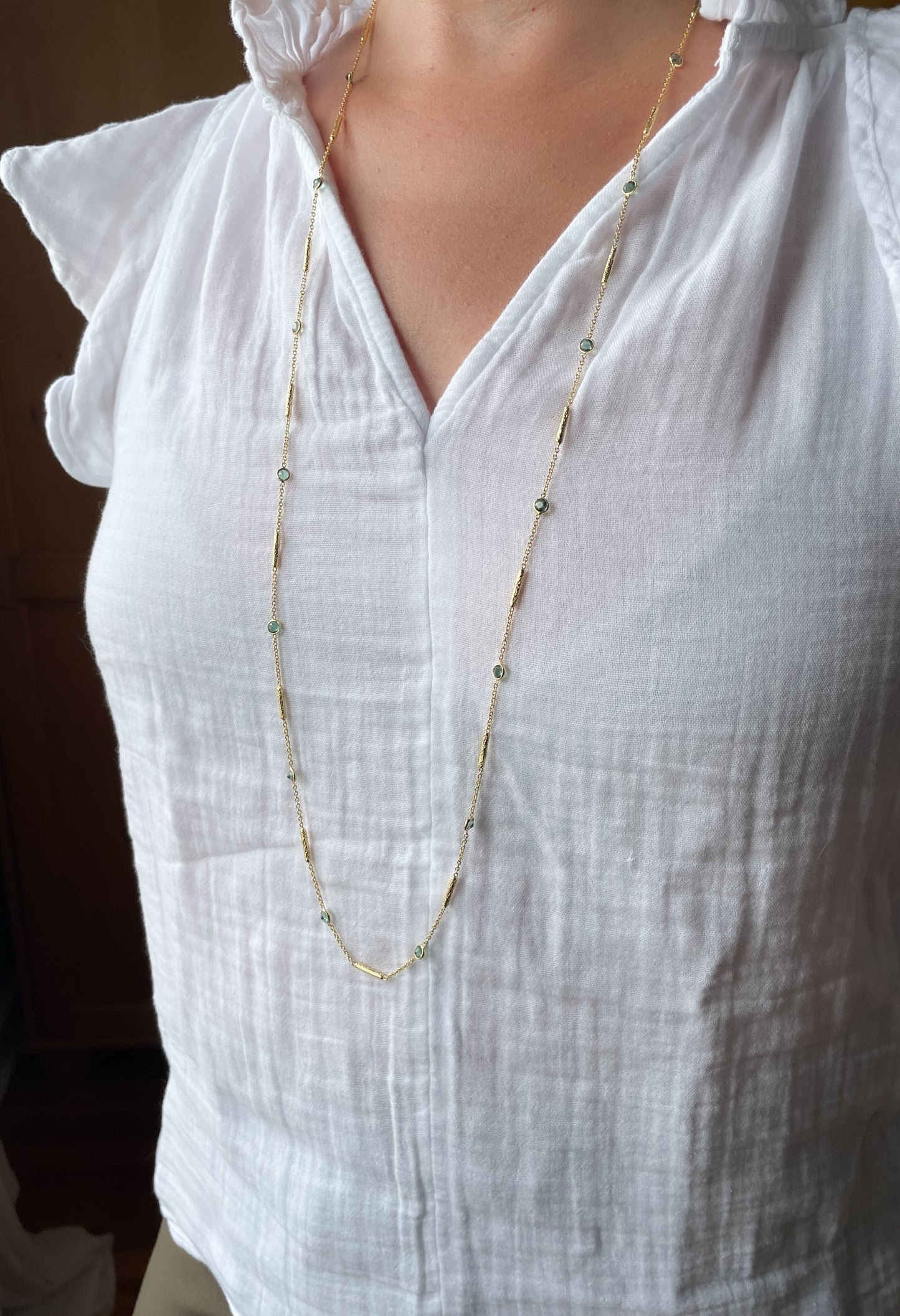 Long green tourmaline necklace with textured tube spacers