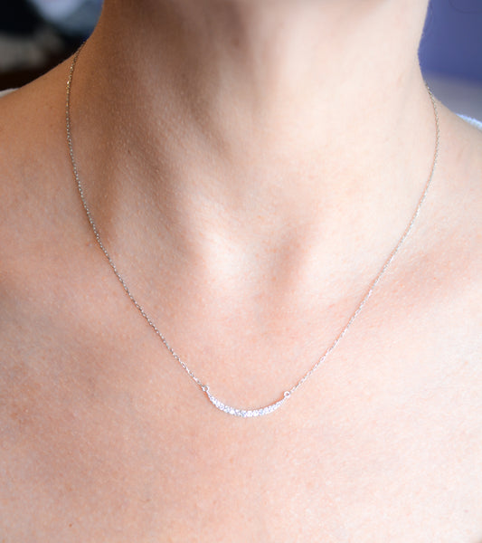 Delicate silver crescent necklace with cubic zirconia
