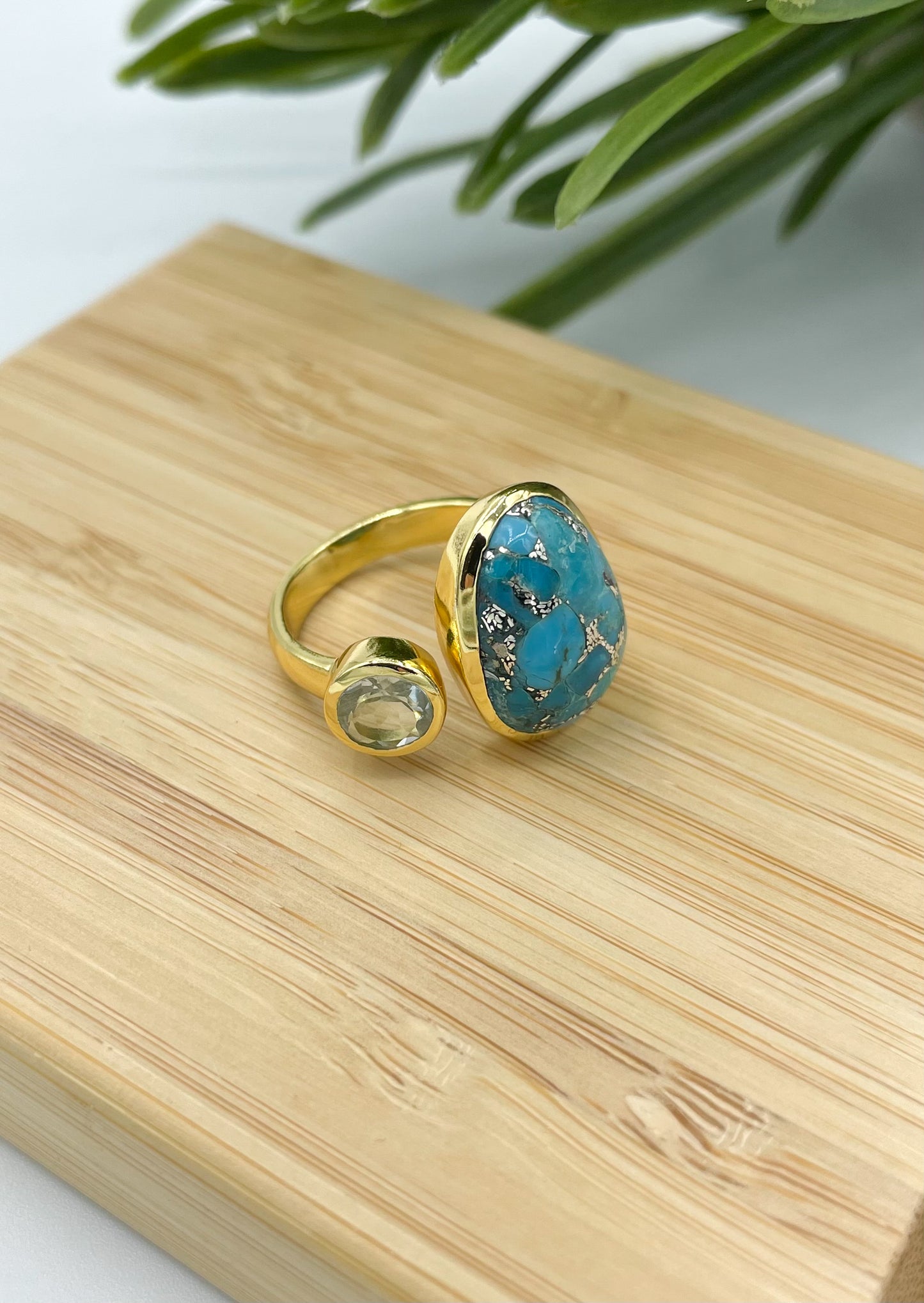 Gold ring with copper turquoise and blue topaz