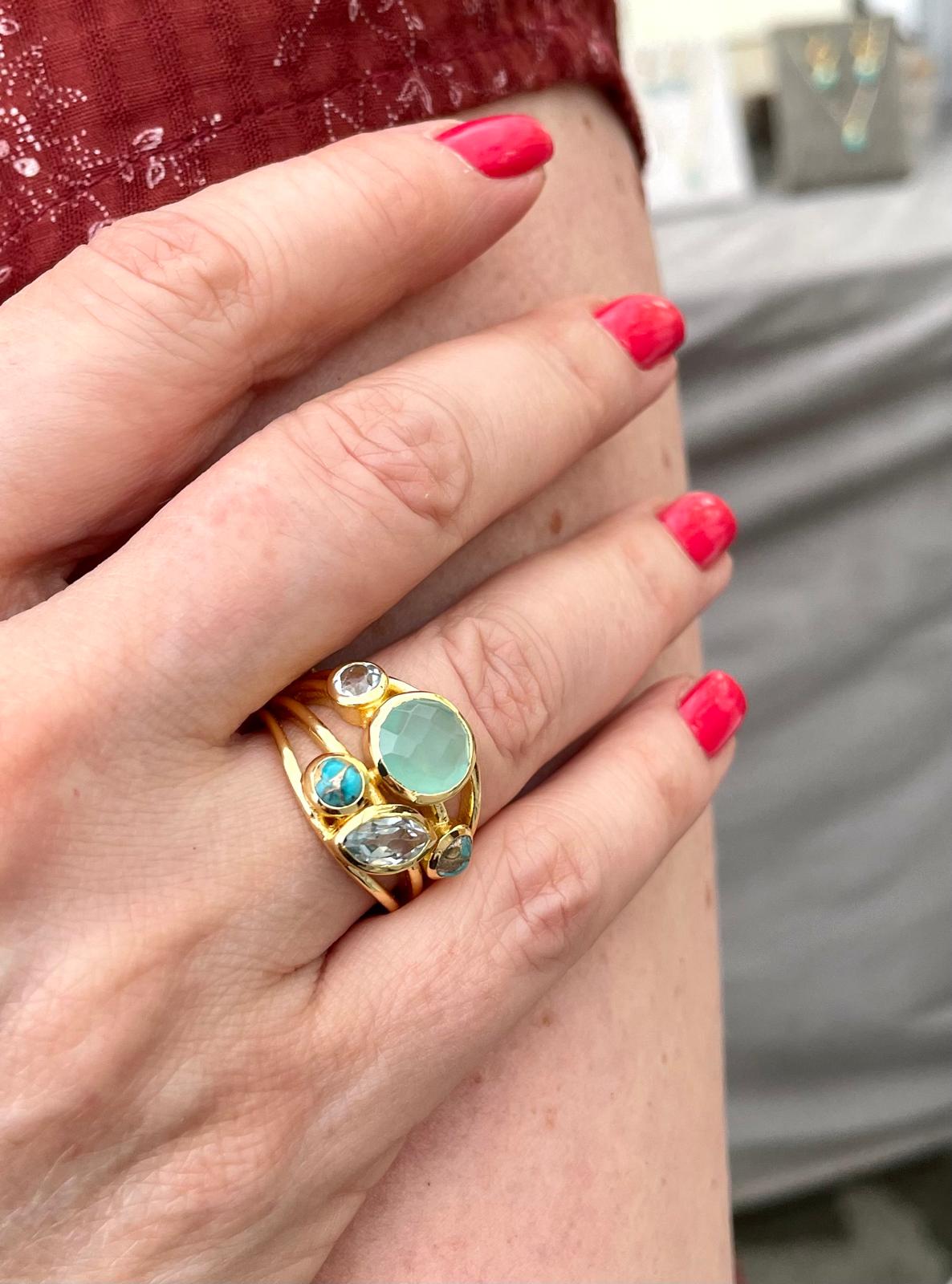 Aqua and blue gold plated ring with assorted stones