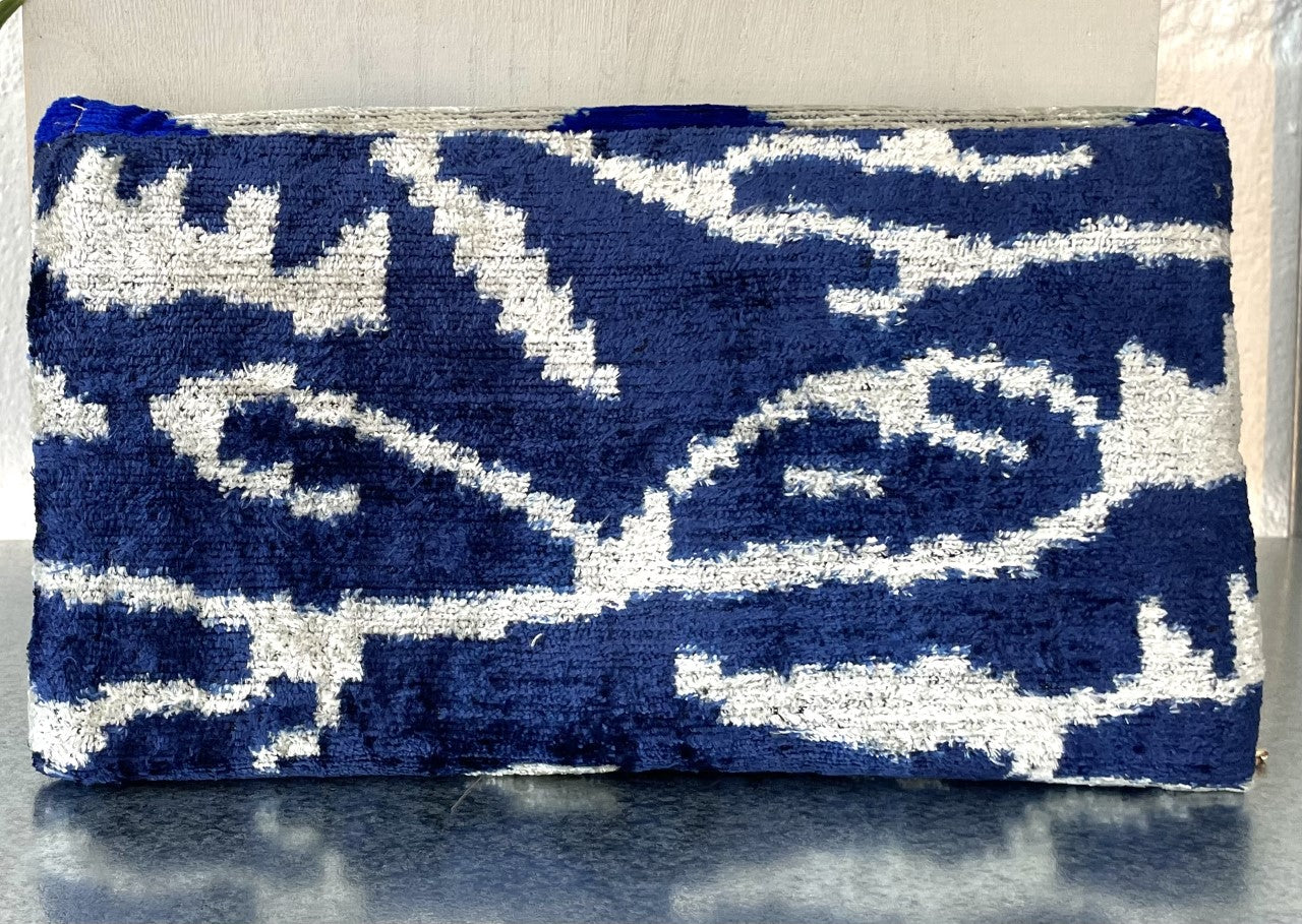 Handwoven silk and cotton clutch with hidden chain strap