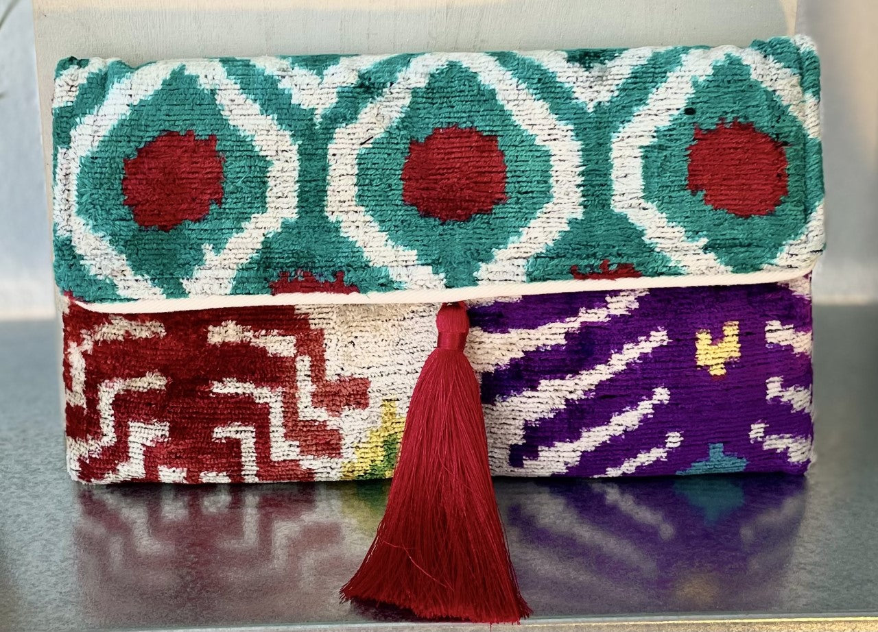 Handwoven silk and cotton clutch with hidden chain strap