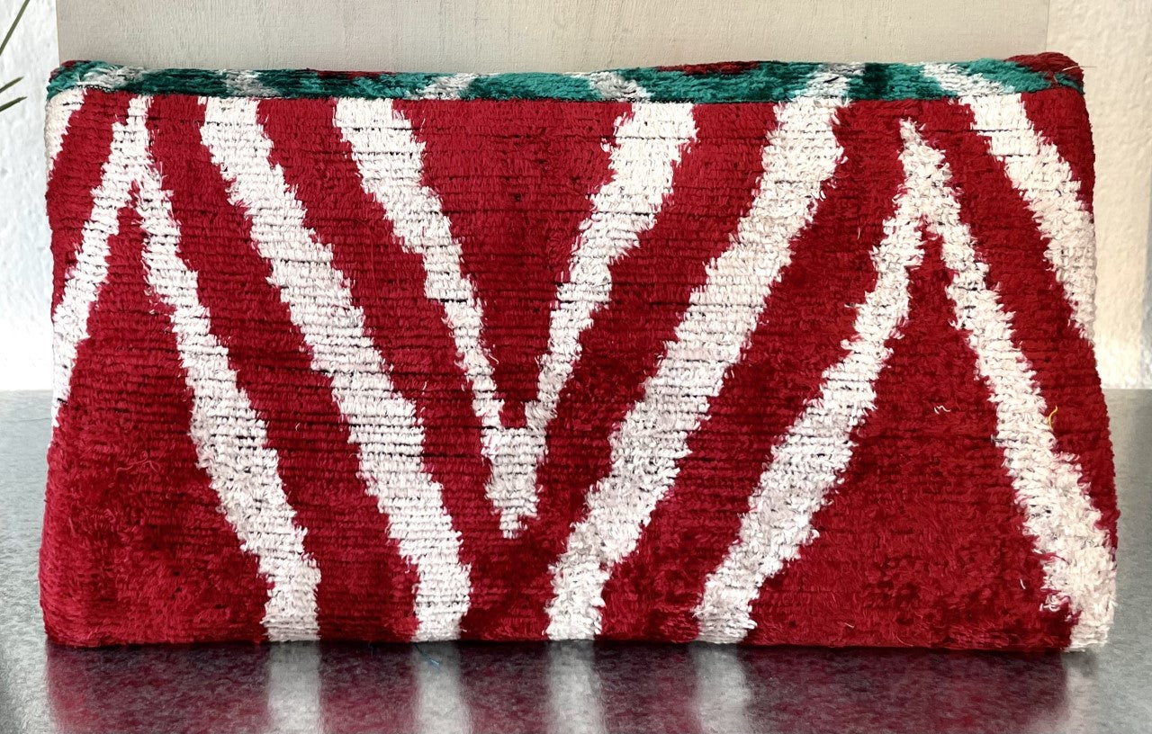 Handwoven silk and cotton clutch with hidden chain strap