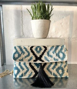 Handwoven silk and cotton clutch with hidden chain strap