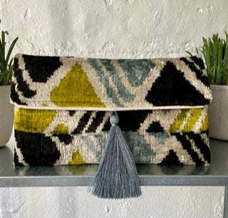 Handwoven silk and cotton clutch with hidden chain strap