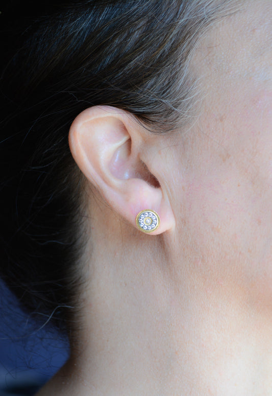 Fancy cubic zirconia two-tone stud earrings in gold plate
