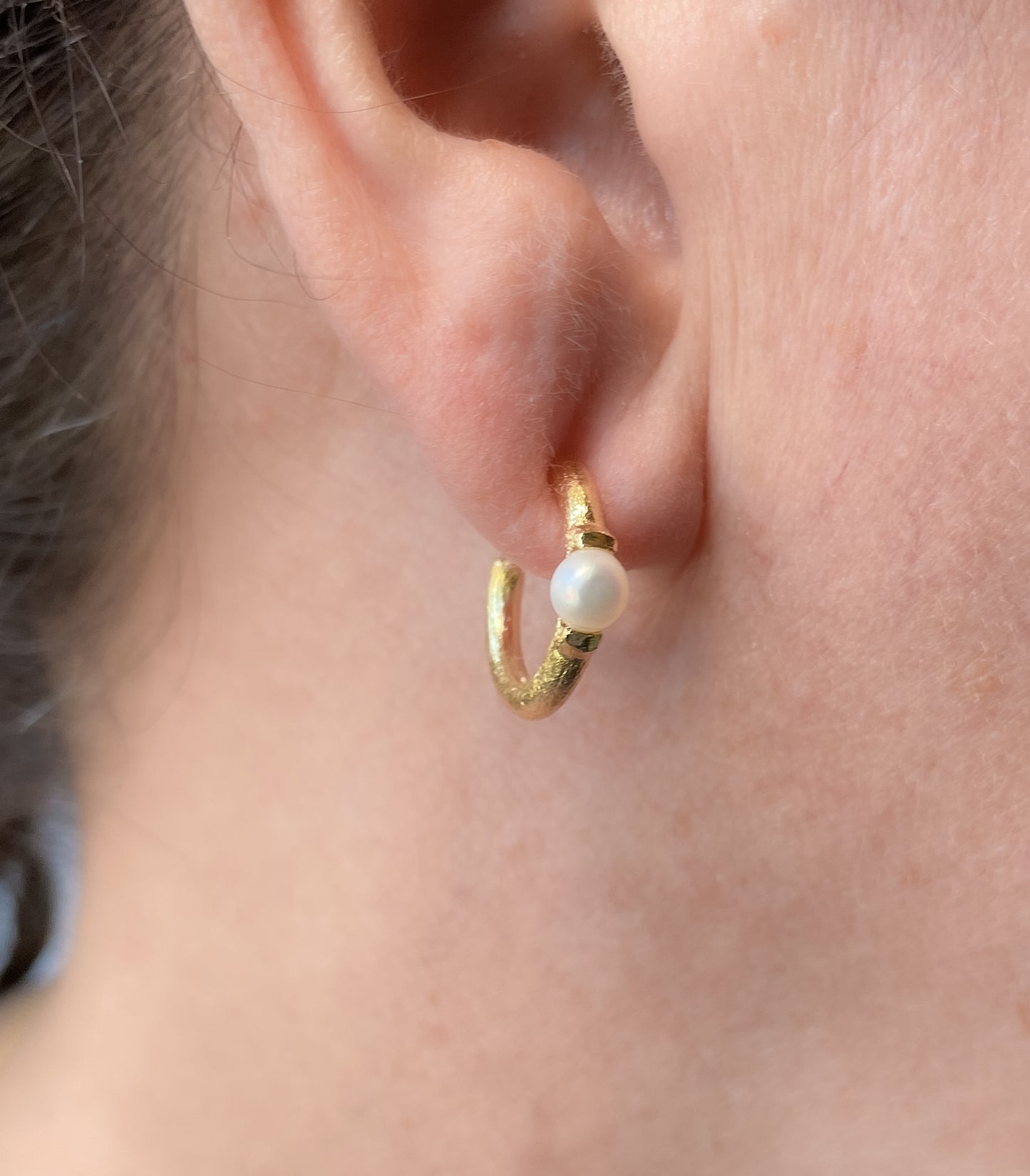 Gold plated textured hoops with pearl accents