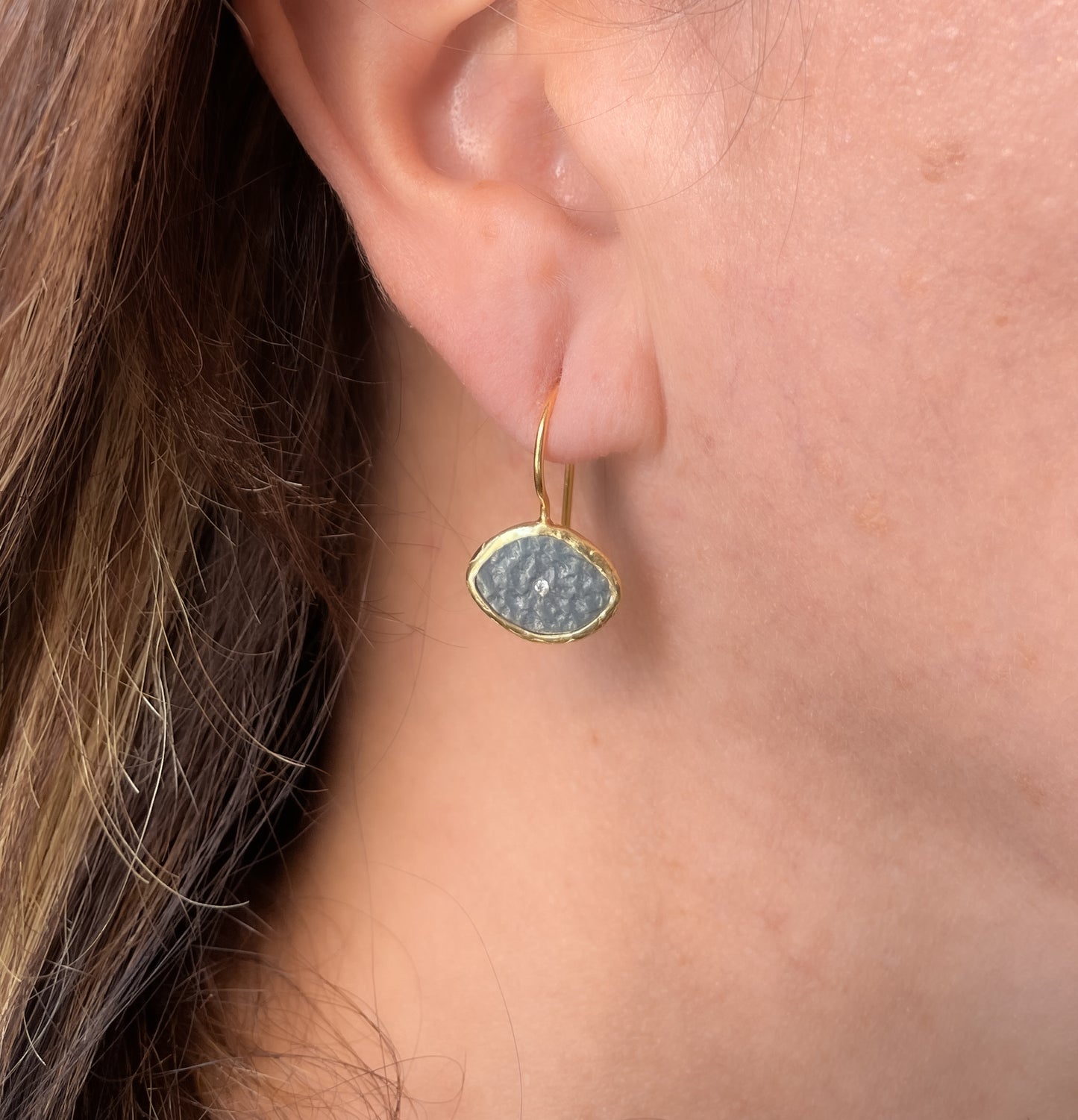 Mix metal eye earrings