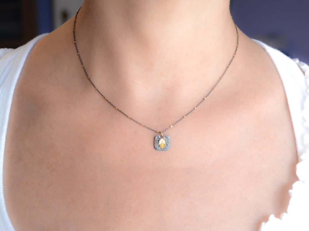 Two-tone Silver Hamsa Necklace With Cubic Zirconia accents