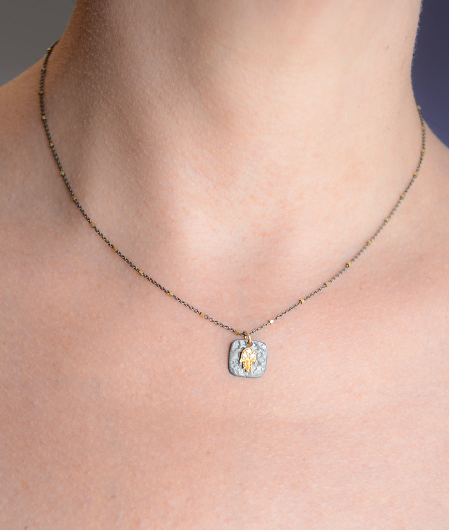 Two-tone Silver Hamsa Necklace With Cubic Zirconia accents