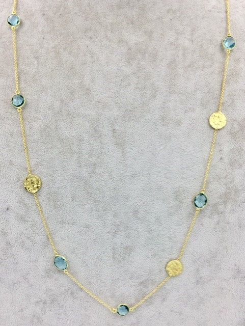 Light Blue topaz necklace with hammered disc accents