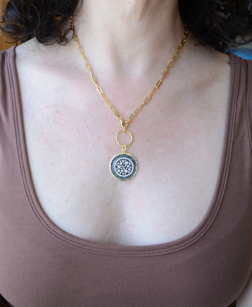 Gold paper clip necklace with cubic zirconia pendant
