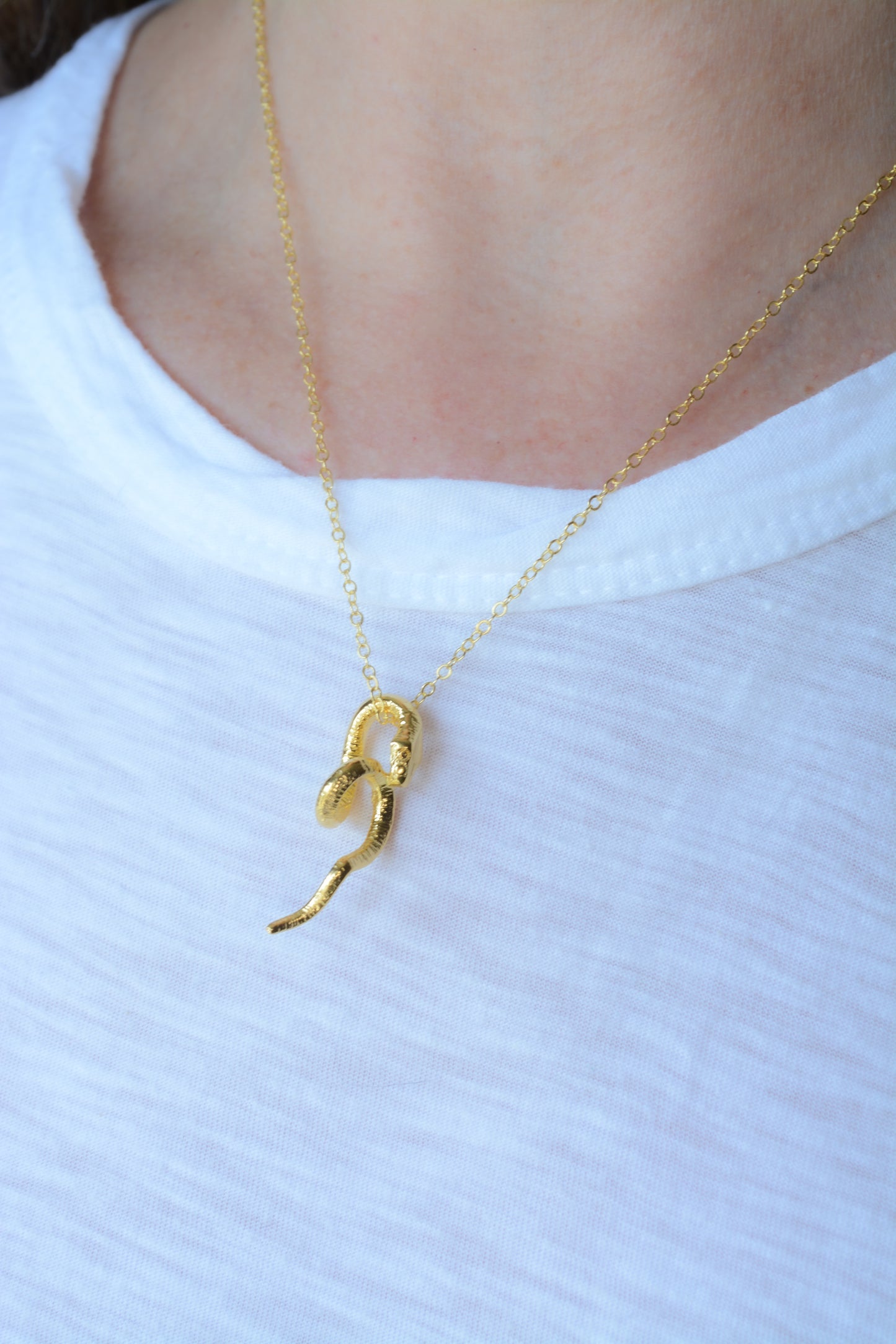 Gold plated snake pendant necklace