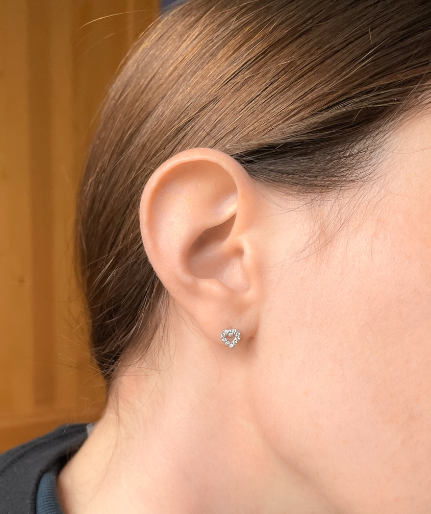 Silver pave set cubic zirconia heart studs