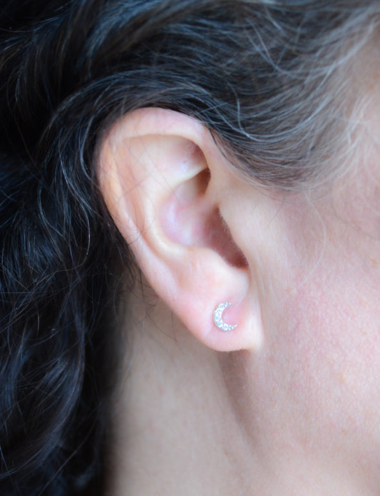Silver crescent moon studs with pave cubic zirconia