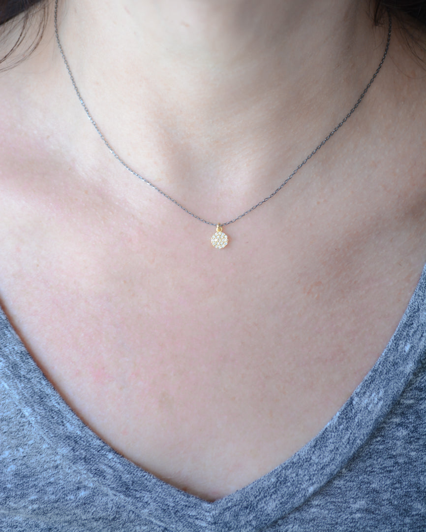 Two-tone necklace with cubic zirconia disc pendant