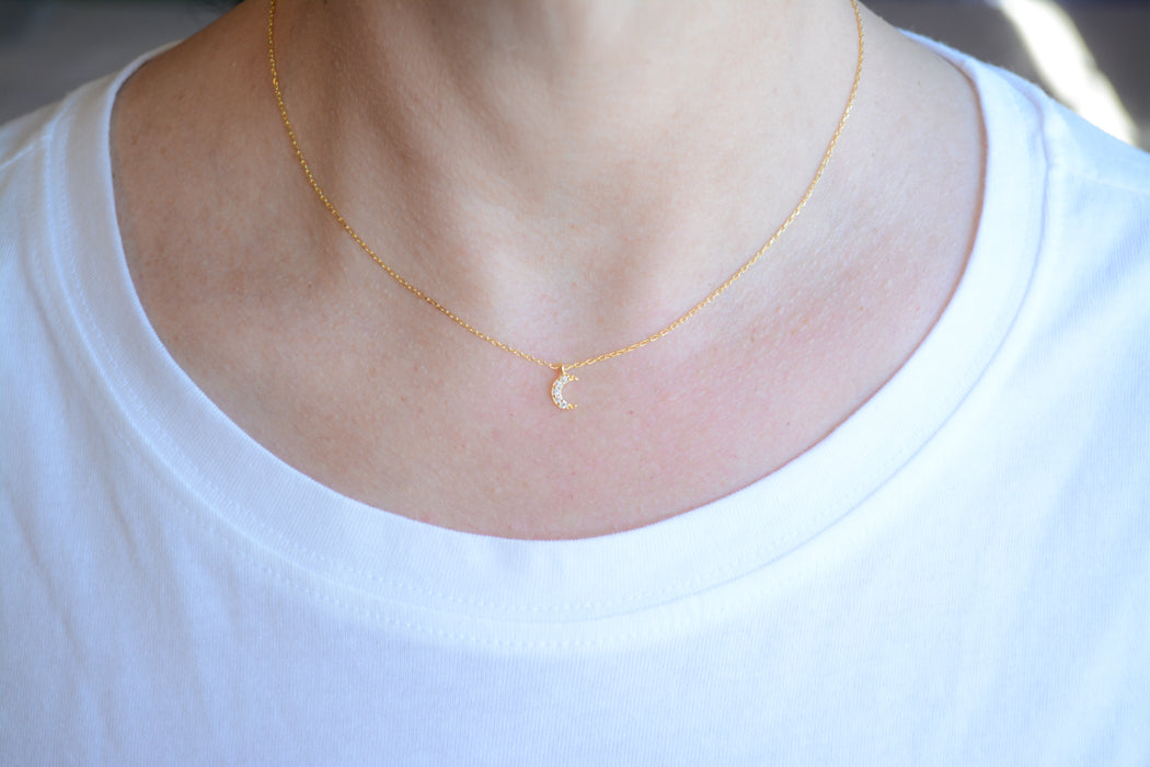 Gold necklace with cubic zirconia moon pendant