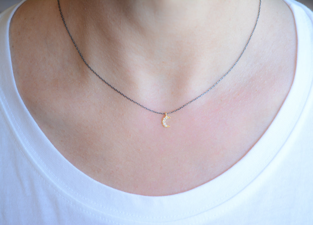 Two-tone necklace with cubic zirconia moon