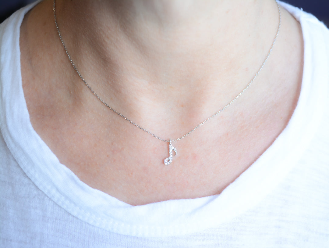 Silver necklace with cubic zirconia music note