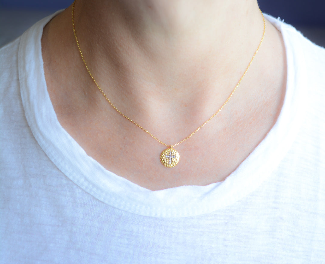 Gold cross necklace with cubic zirconia accents