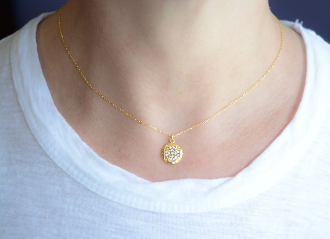 Gold Maltese cross necklace with cubic zirconia accents