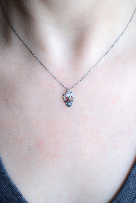 Dark Rhodium Skull necklace with cubic zirconia accents