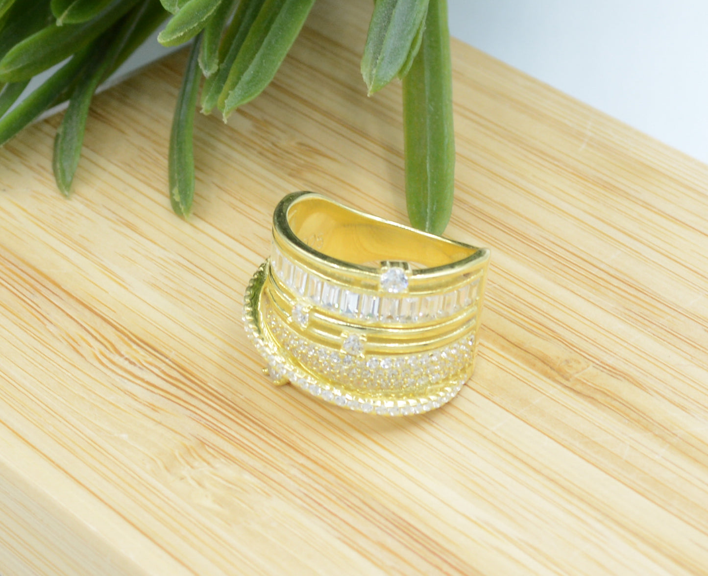 Gold plated satellite ring with cubic zirconia
