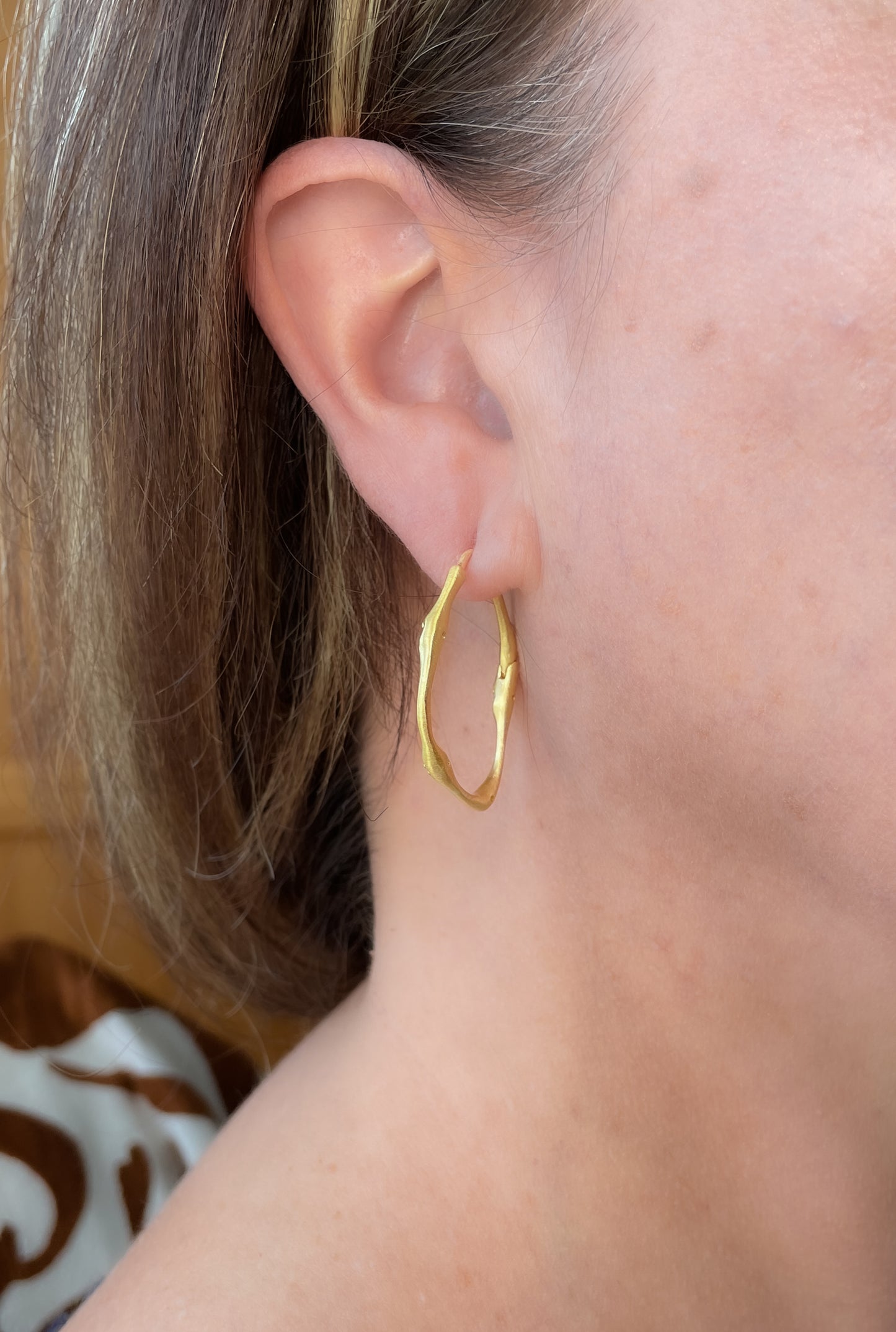 Organic-look handmade earrings with cubic zirconia