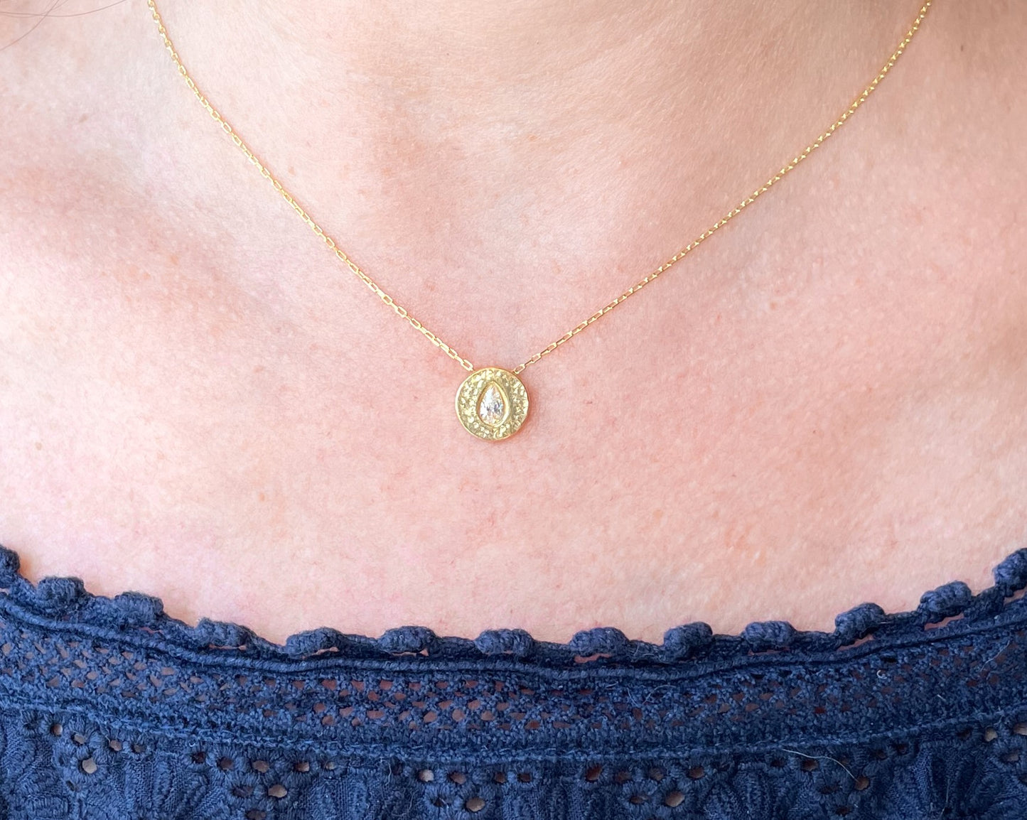 Gold necklace with cubic zirconia teardrop