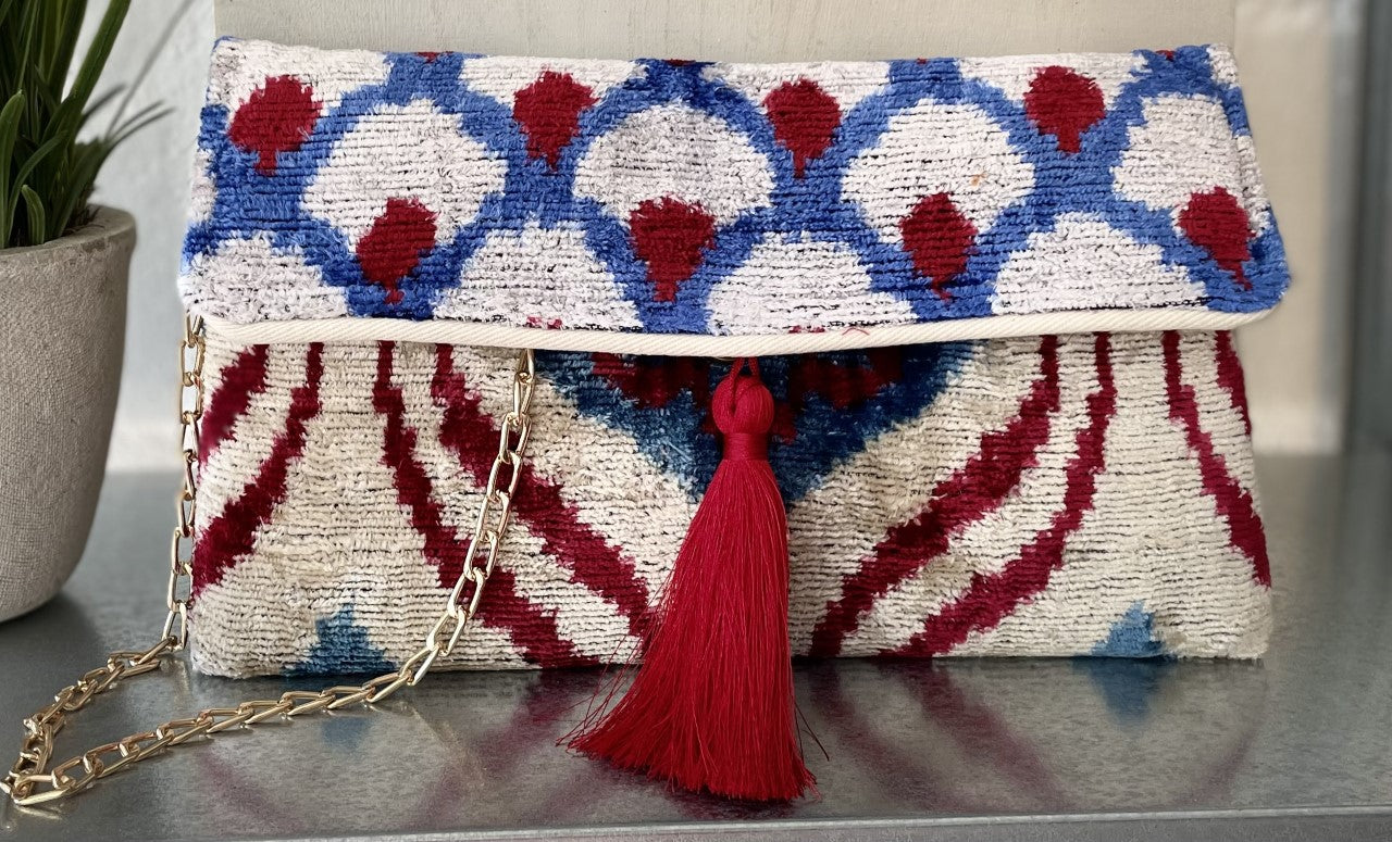 Handwoven silk and cotton clutch with hidden chain strap