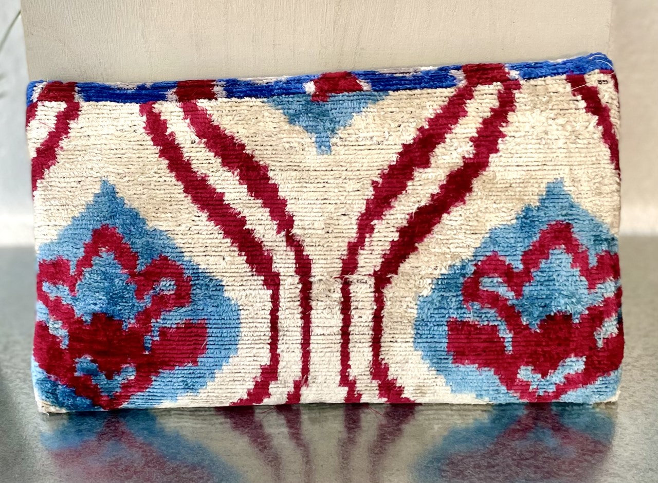 Handwoven silk and cotton clutch with hidden chain strap