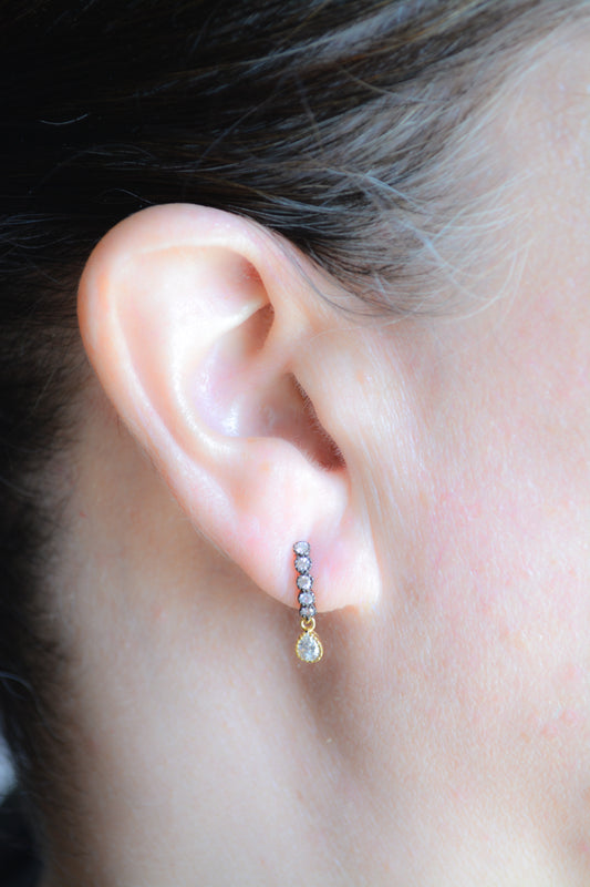 Two-tone cubic zirconia studs with teardrop dangle