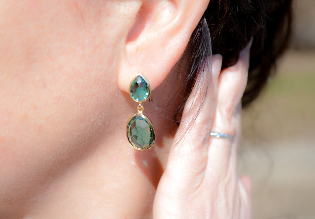 Green tourmaline earrings in gold plated brass.