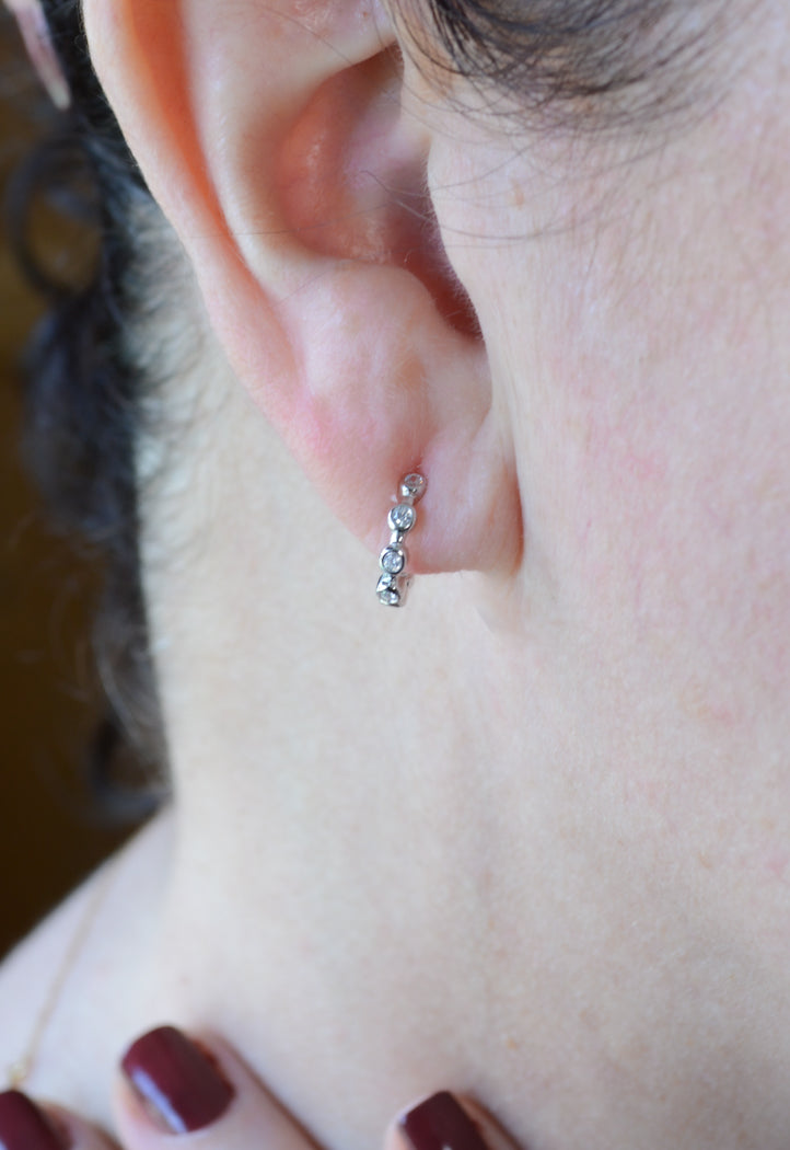 Tiny silver hoops with cubic zirconia