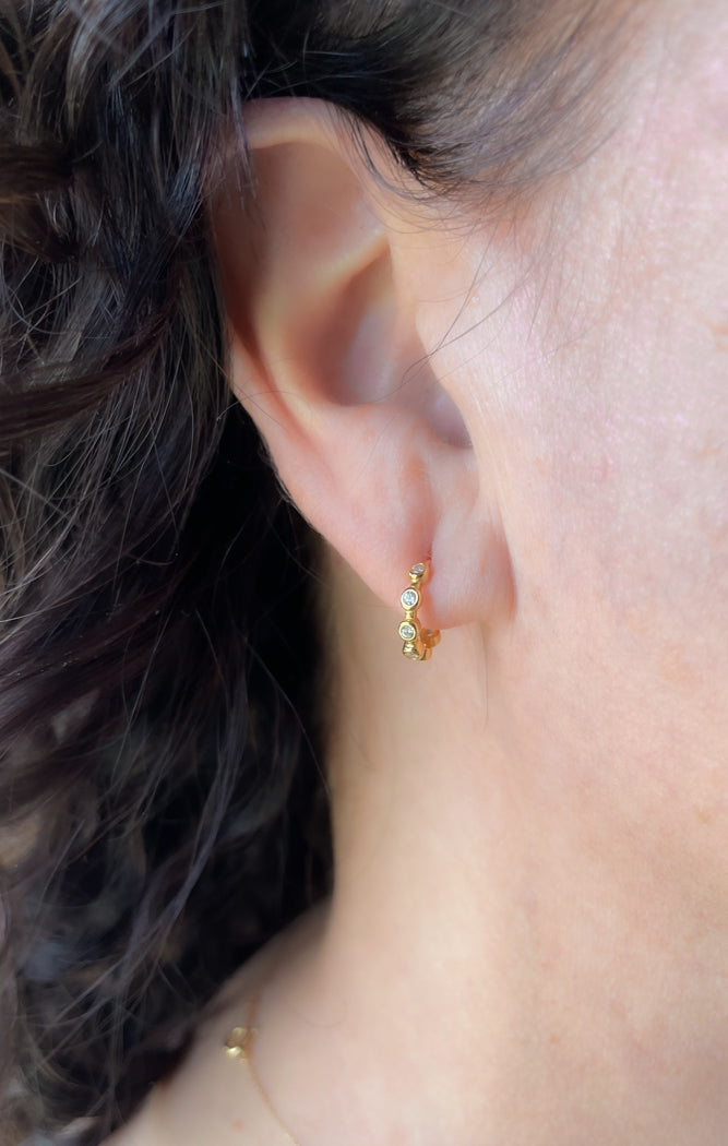 Tiny gold hoops with cubic zirconia