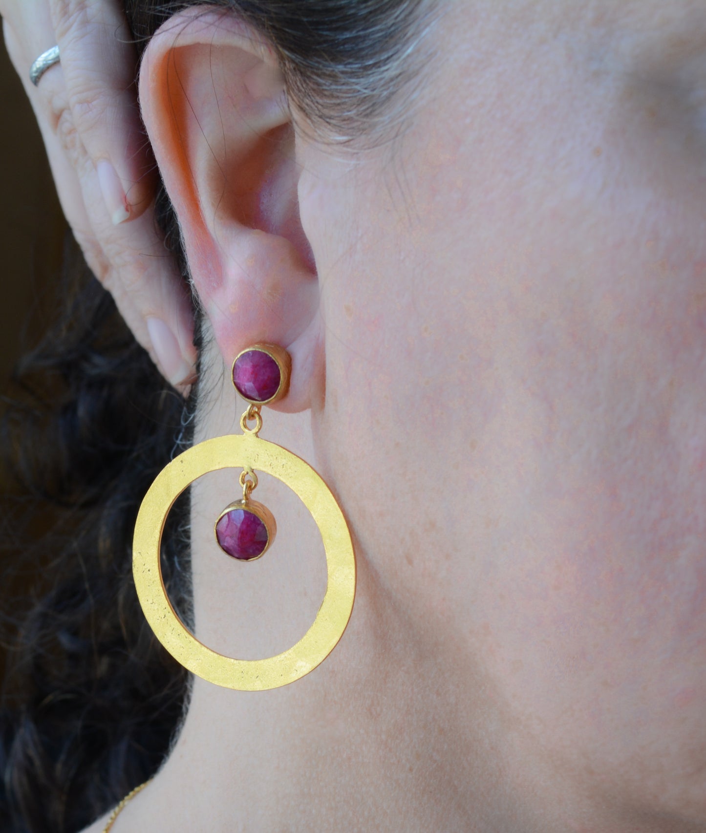 Hammered hoops with post and Ruby stones