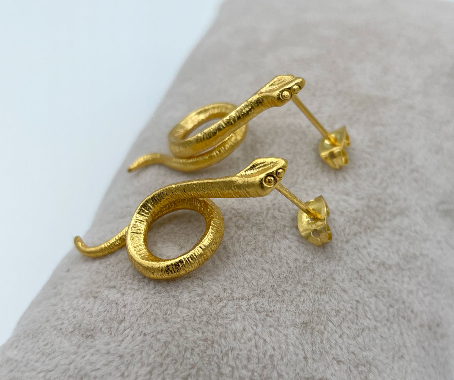 Gold plated snake earrings
