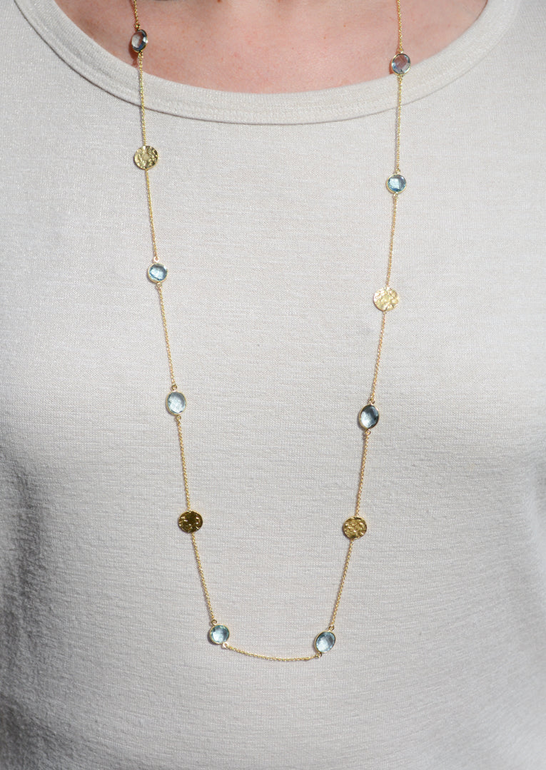 Light Blue topaz necklace with hammered disc accents