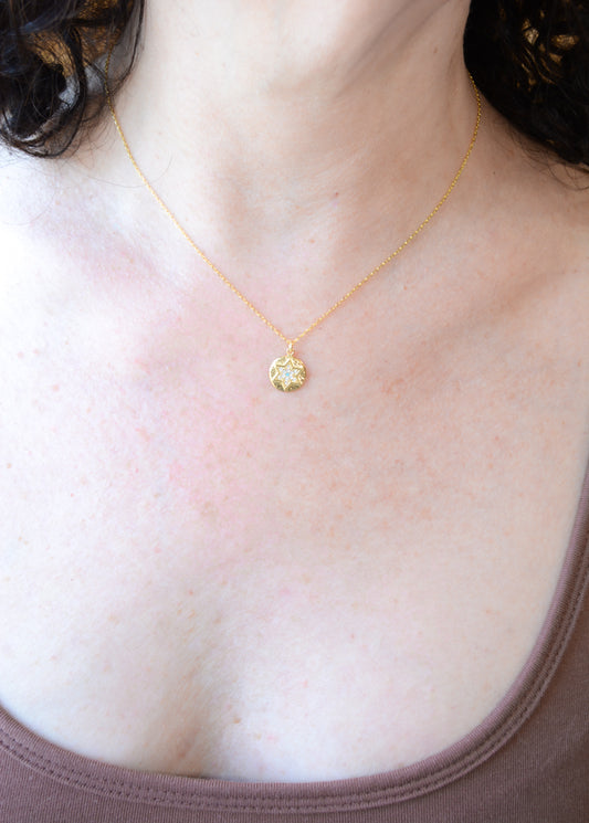 Gold Star of David necklace with cubic zirconia accents