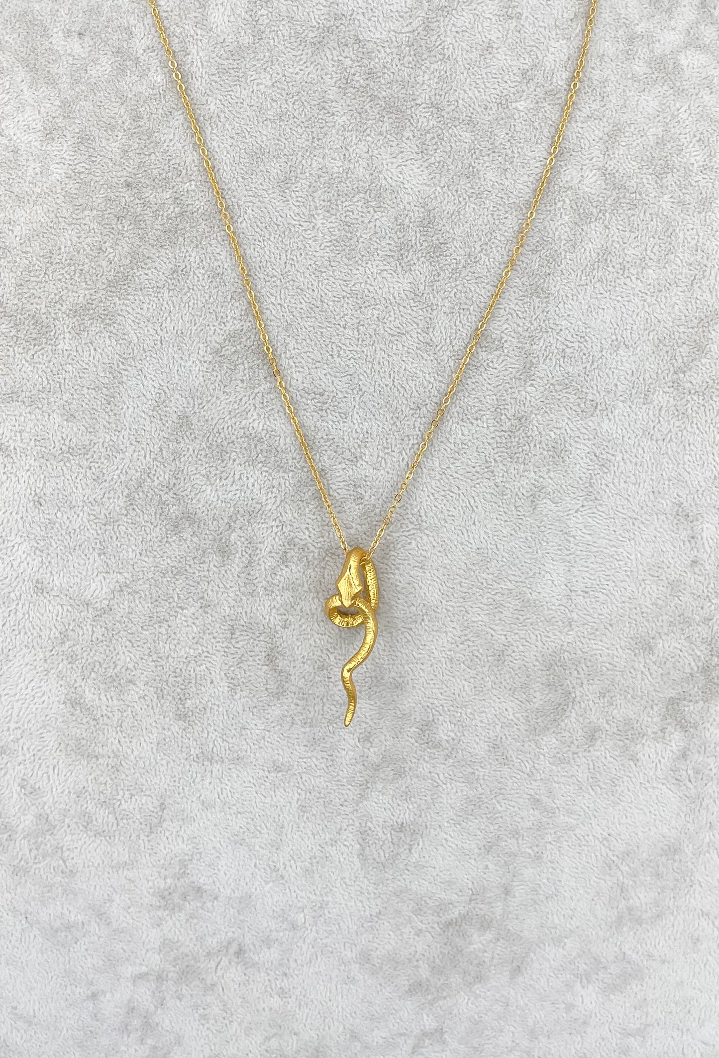 Gold plated snake pendant necklace