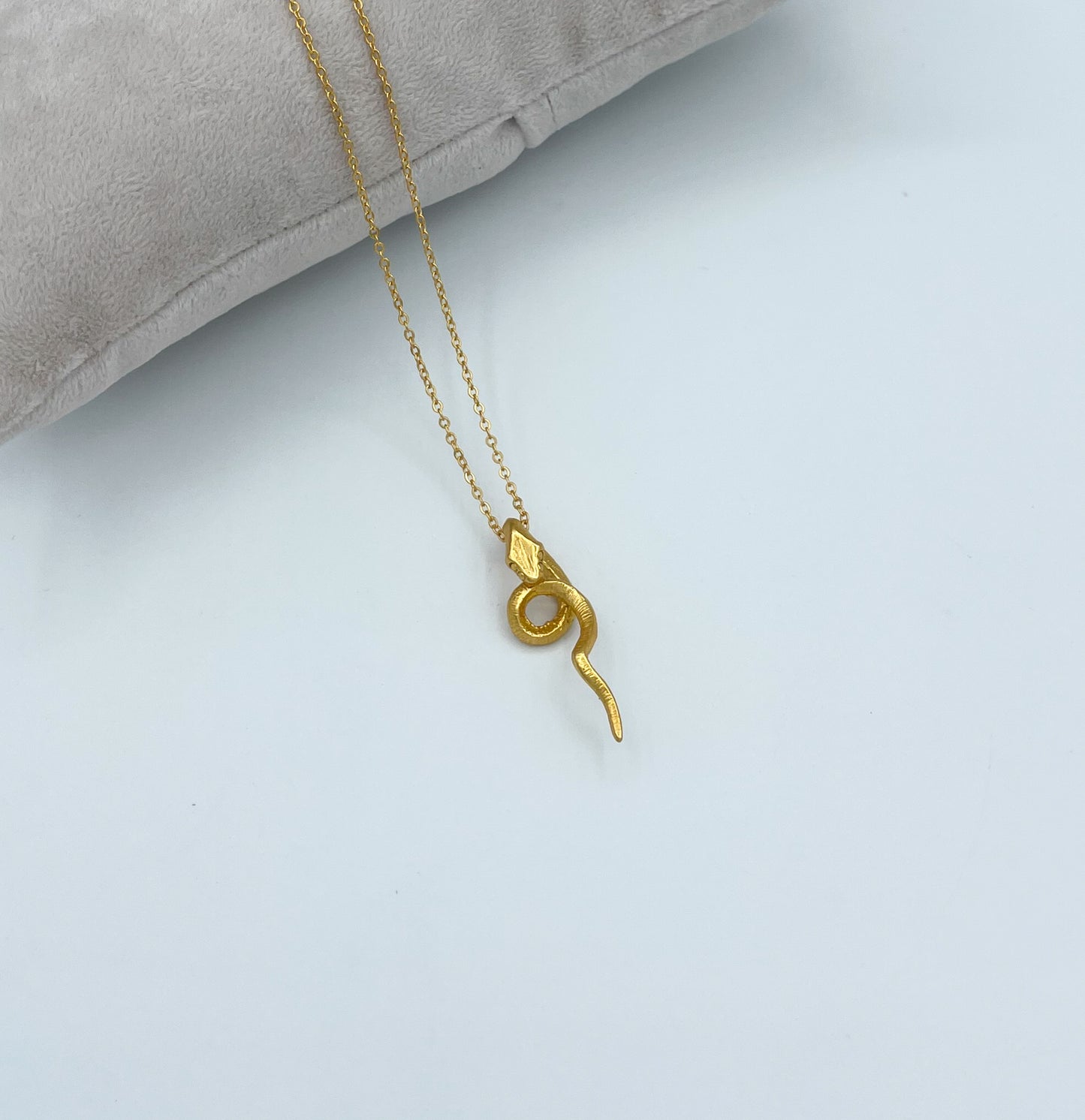 Gold plated snake pendant necklace