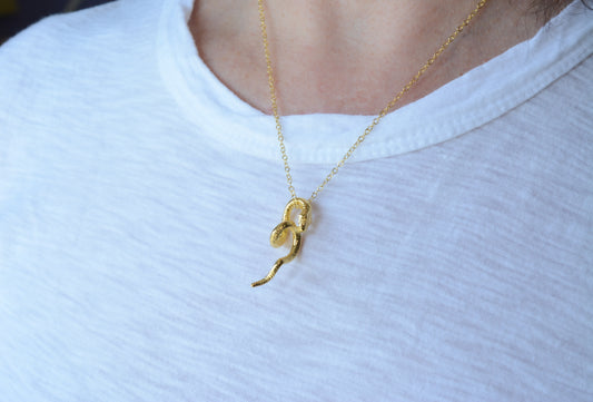 Gold plated snake pendant necklace