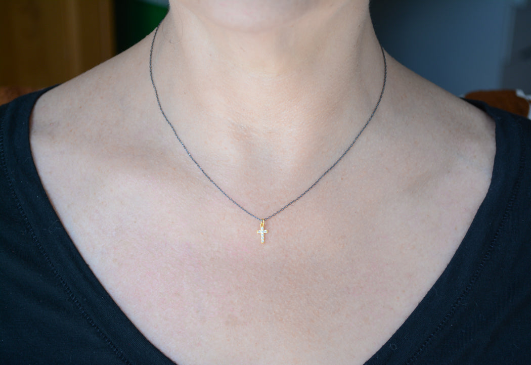 Two-tone necklace with cubic zirconia cross